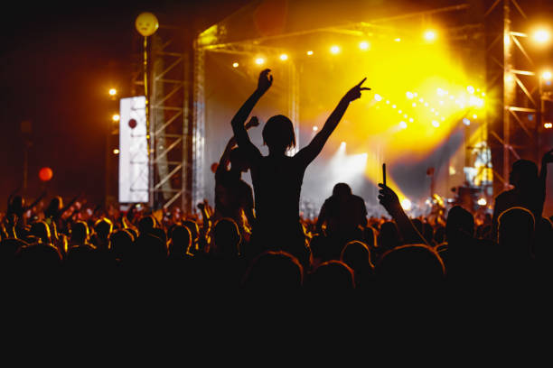 istock Happy crowd at a music festival. 1397916768