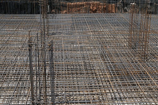 The rebar is bonded with steel wire for use as a construction infrastructure. Which part of the rebar has rusted due to chemical reactions.