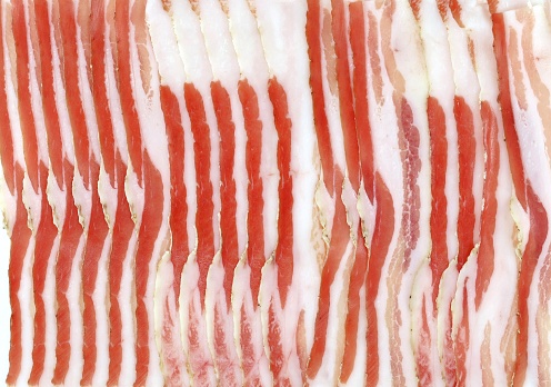 Studio shot of boiled Pork Belly Bacon Rasher, Isolated on White Background.