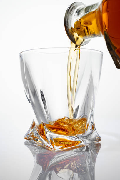 istock Pouring luxury whiskey into a crystal glass 1397919701