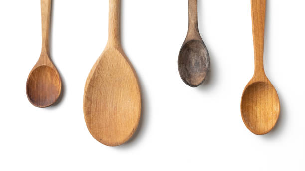 istock Wooden kitchen spoons isolated on white background 1397919948