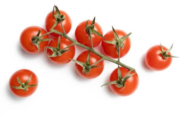 istock Bunch of fresh, red tomatoes isolated on white background 1397919980