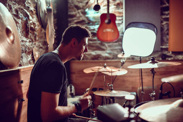 istock Focused Drummer Grooving Through Song 1397923394