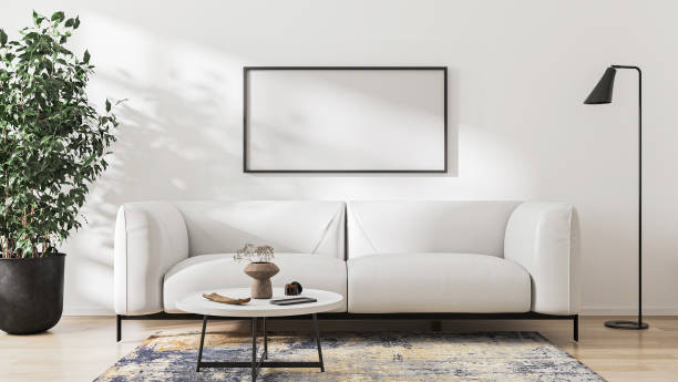 istock blank picture frame mock up in modern light living room interior with white sofa, 3d rendering 1397924225