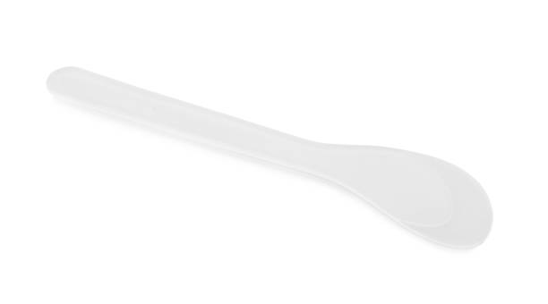 istock Plastic spatula for depilatory wax isolated on white 1397925855