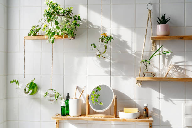 istock White tile wall with woonden shelves and comstics on them 1397927185