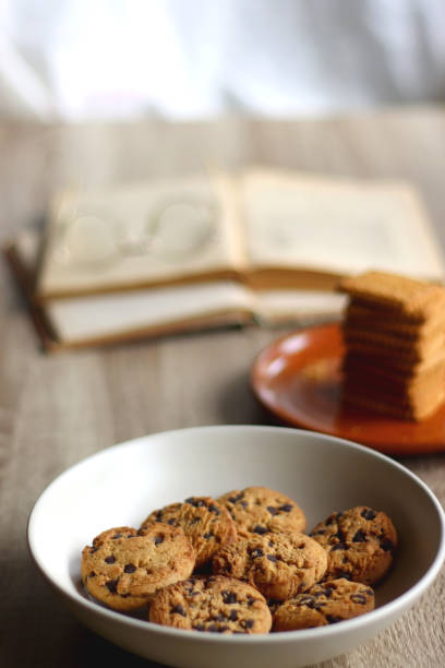 istock Cookies, Biscuits, Books and Glasses 1397927475