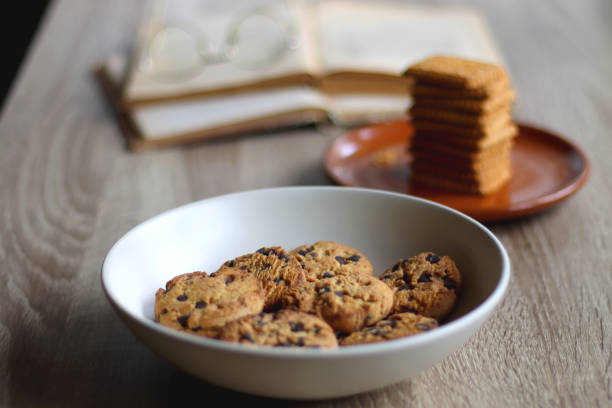 istock Cookies, Biscuits, Books and Glasses 1397927506
