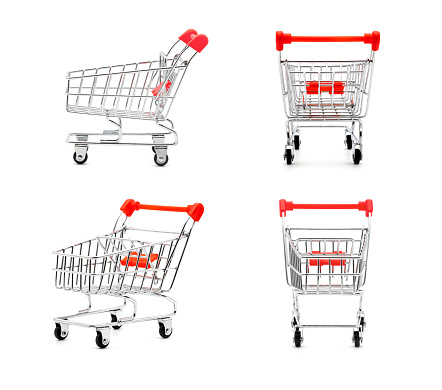 Collection of grocery toy shopping cart with red handle isolated on white background, suitable for marketing and shopping product advertisement.