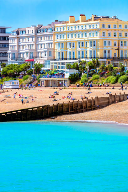 istock Unidentifiable people enjoy a British beach 1397927766