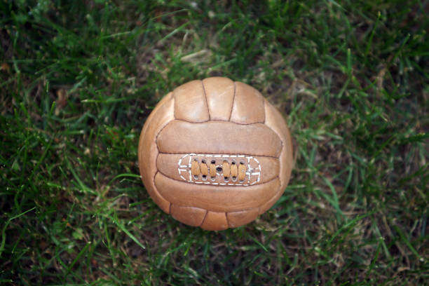 Retro soccer ball on grass