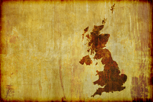 Illustration of a grunge, antique style map of Great Britain (England, Ireland, Scotland and Wales) burned on to old wood board. With Copy-space for text.
