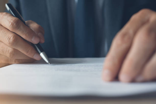 istock Businessman signing contract 1397931039