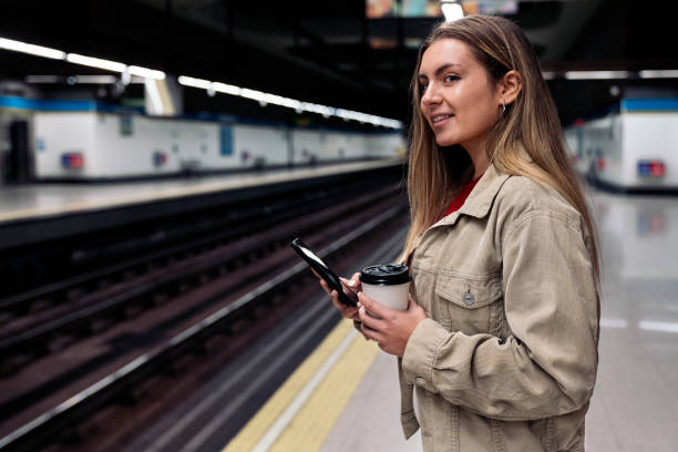 istock Young Girl Waiting in Train Platform 1397932505