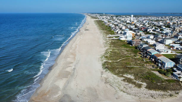 istock Blue Waves and Coastal Cottages on an Outer Banks Beach 1397933903
