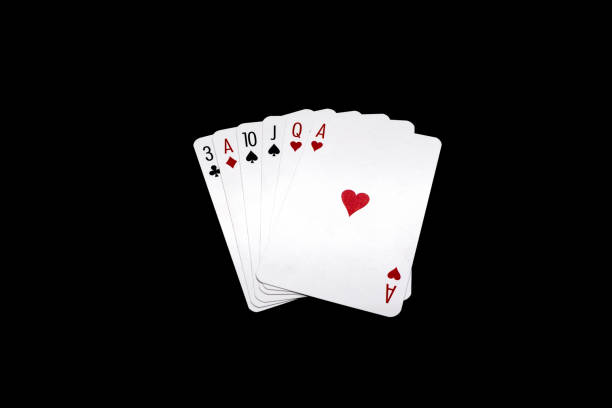 istock Poker hand isolated on black background 1397934768