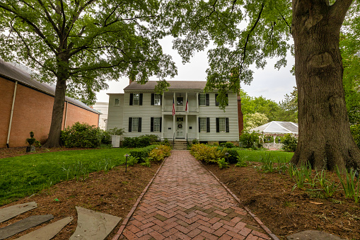 Raleigh, North Carolina, USA - May 1, 2022:  built in 1792 for Treasurer John Haywood.  A a two-story, five bay Federal Style house.