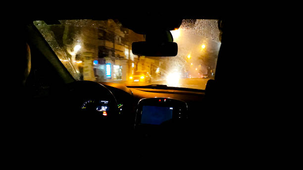 istock Night Urban Scene Car Point of View 1397936091