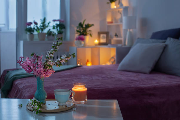 istock cozy bedroom in  evening with flowers and tea 1397941703