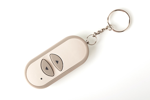 Infrared remote control or keychain for remote control. Isolated object on white background