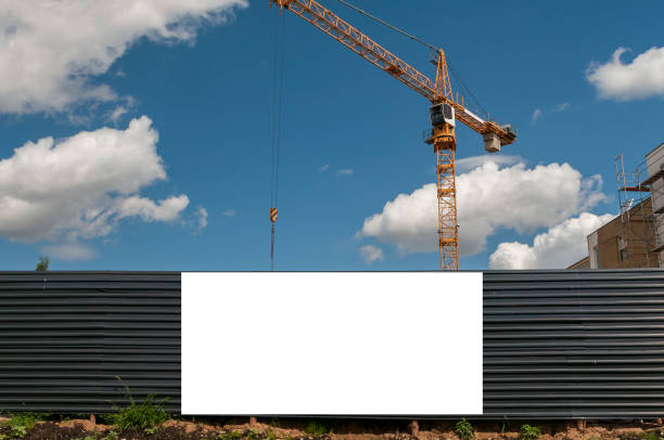 istock Blank white banner for advertisement on the fence of construciton site 1397943370