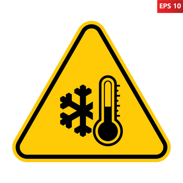 Low temperature warning sign. Low temperature warning sign. Vector illustration of yellow triangle sign with snowflake and thermometer icon inside. Very cold and freezing. Caution symbol isolated on background. Winter concept. weather warning sign stock illustrations