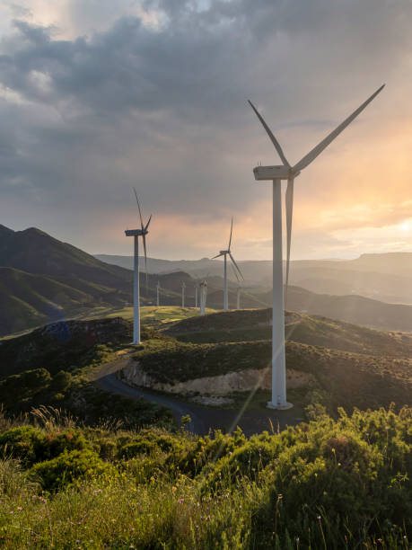 istock Sunset with Wind Turbines, Wind Energy. 1397943514