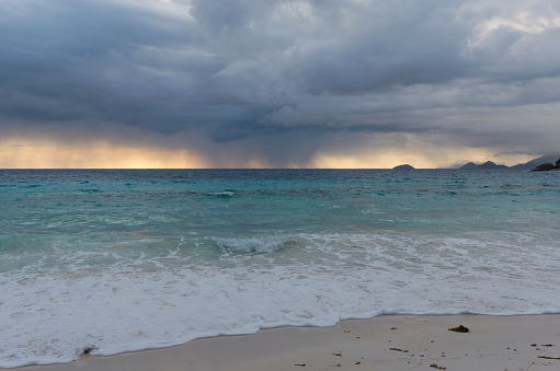 Breathtaking view of the Anse Takamaka beach on a stormy day, Mahe Island, Seychelles
