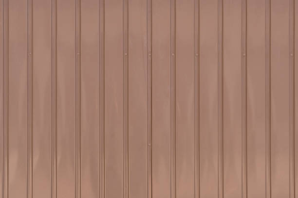 istock Vertical pattern of light brown metal plate background texture 1397948692