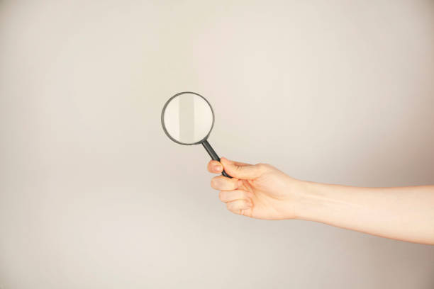istock woman hand magnifier 1397950182