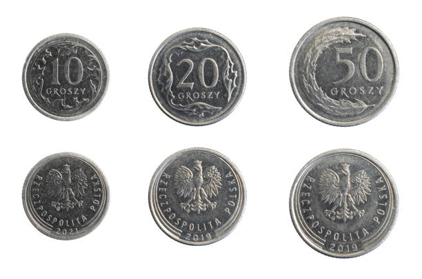 istock Polish gold and penny coins on a white isolated background 1397954540