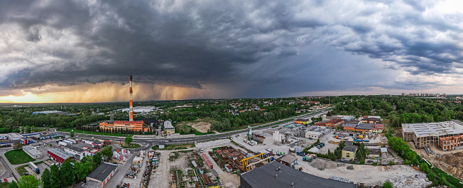 Panoramic View Over Industrial Plant and Storm Sky. Drone View.