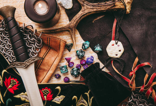 istock Fantasy, role play,board game, still life, concept, Background, decorated,character, objects, tools, Dagger, dragons, dungeons,chain mail, amulet, clothing, dice set,D10, D20, D12, D6, D8 1397955270