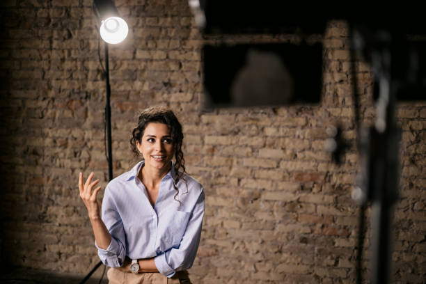 istock Young woman giving an interview in a studio 1397962129