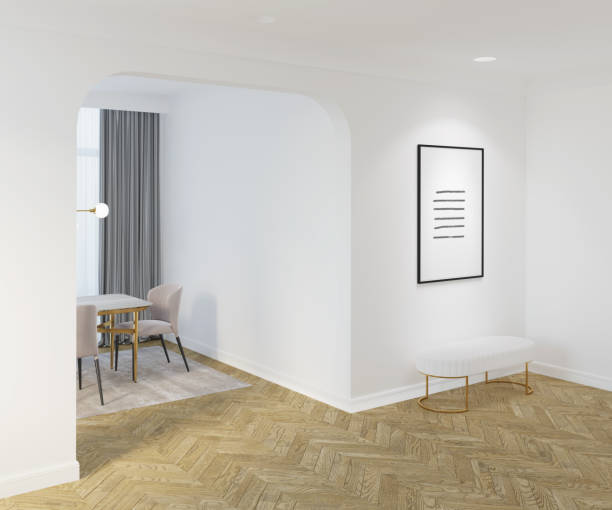 istock A bright interior with a backlit vertical poster over a white ottoman on the parquet floor, a wide arch through which you can see the dining table with chairs near a window with curtains. 1397963358