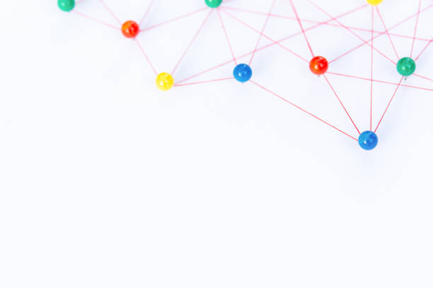 istock Linking entities, Blockchain, social media, Communications Network, The connection between the two networks. Network simulation on paper linked together by yarn 1397963573