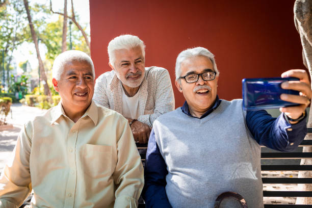 istock Happy senior men taking selfie with mobile phone 1397965593