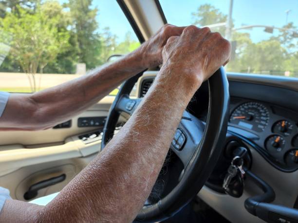 istock Transportation.  Man driving vehicle on spring day. 1397969168