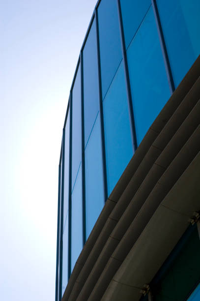istock Architectural details of modern office building with reflections. 1397969479