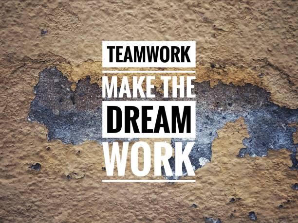 istock Motivational quote written with TEAMWORK MAKE THE DREAM WORK 1397971739
