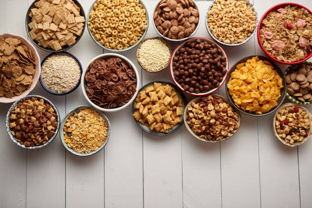 istock Assortment of different kinds cereals placed in ceramic bowls on table 1397973125