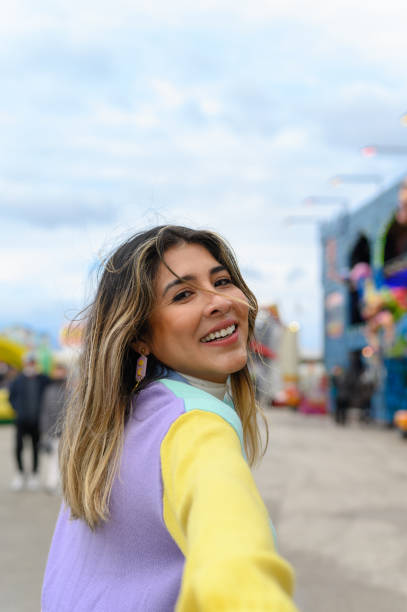 istock Smiling woman on street 1397973357