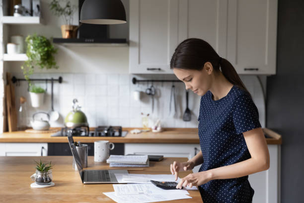 istock Woman calculate expenses, makes personal finances analysis 1397975028