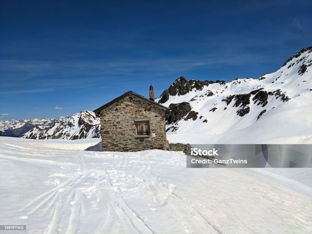 Ski tour on the Wiss Platte mountain above Sankt Antonien in Graubunden, Switzerland. Ski mountaineering in winter. Accidents and Disasters Stock Photo
