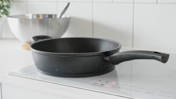 istock Black frying pan on induction hub 1397977834