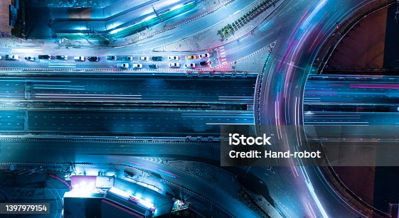 istock Expressway top view, Road traffic an important infrastructure,car traffic transportation above intersection road in city night, aerial view cityscape of advanced innovation 1397979154