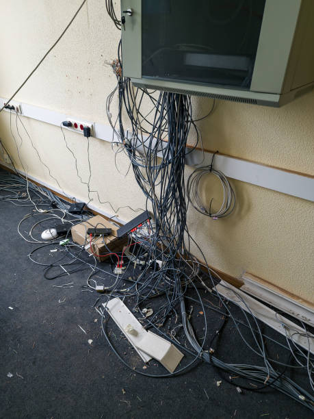 istock Messy server room with internet cables, wires and various equipment. 1397979240