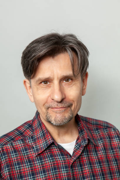 istock Studio portrait of a 64 year old man 1397985769
