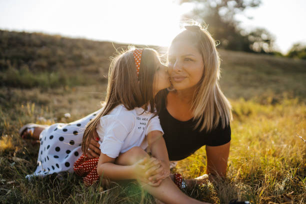 istock Mother and daughter bonding in nature 1397985784