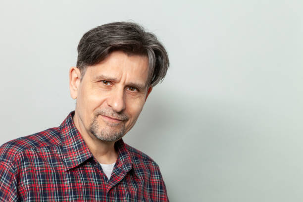 istock Studio portrait of a 64 year old man 1397985872